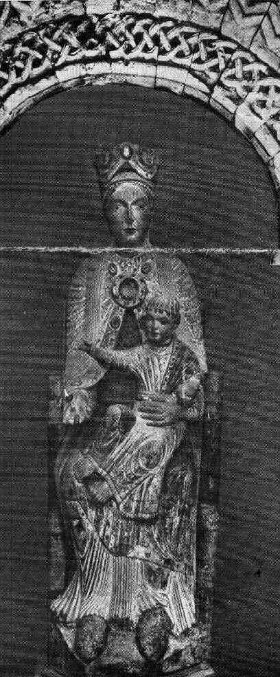 Virgem em majestade: imagem do sc. XII na Basli-ca de Saint Denis. Superposto em montagem: frag-mento do tmpano da igreja de la Lande-Cubzac, sc. XII.